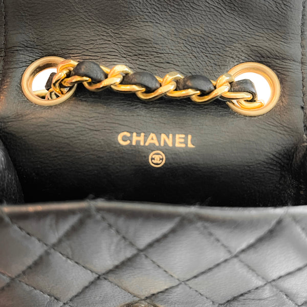 Sold at Auction: CHANEL, circa 2004/05 SAC-CEINTURE en cuir caviar  matelassé noir, garnitures en métal doré, ceinture amovible 16 x 9 x 4  cm